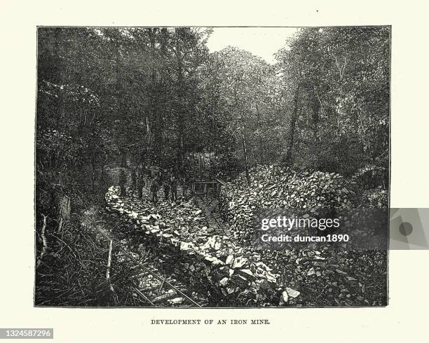 middlesborough kentucky, development of an iron mine, 19th century - iron ore stock illustrations