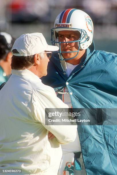 Head coach Don Shula of the Miami Dolphins talks with Dan marino a NFL football game against the Philadelphia Eagles on December 13, 1987 at Veterans...