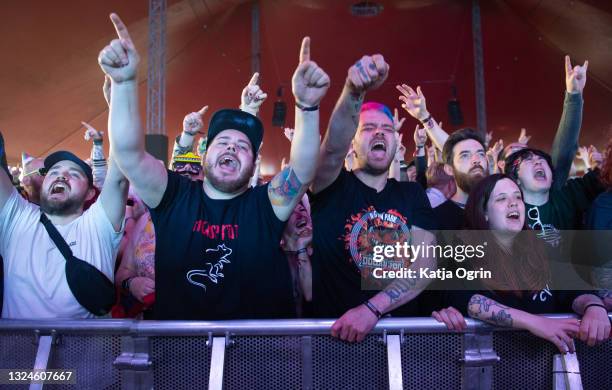 Music fans on day three of Download PILOT at Donington Park on June 20, 2021 in Donington, England. Download PILOT is a 10,000 capacity festival part...