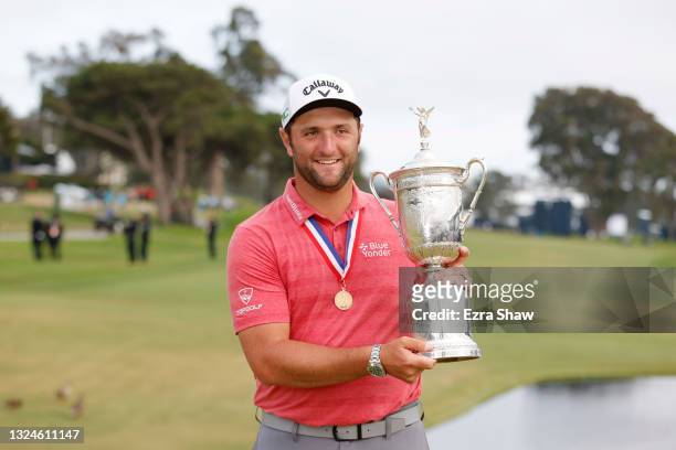 Jon Rahm of Spain celebrates with the trophy after winning during the final round of the 2021 U.S. Open at Torrey Pines Golf Course on June 20, 2021...