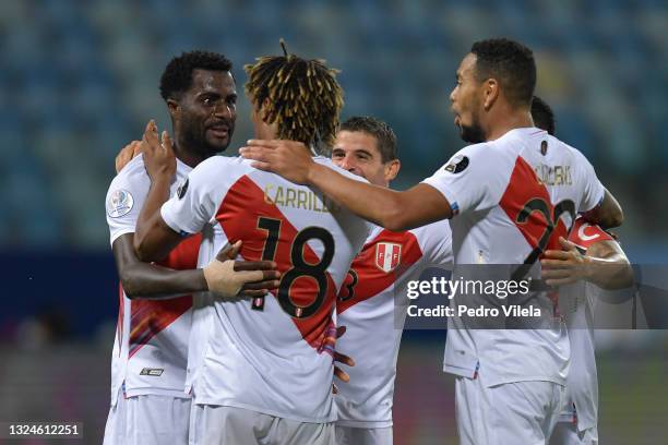 Christian Ramos, André Carrillo and Alexander Callens of Peru celebrate with teammates after their second goal scored by an own goal of Yerry Mina of...