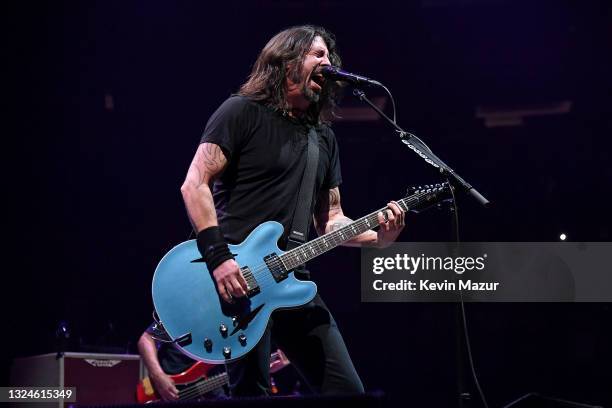 Dave Grohl performs onstage as The Foo Fighters reopen Madison Square Garden on June 20, 2021 in New York City. The concert, with all attendees...