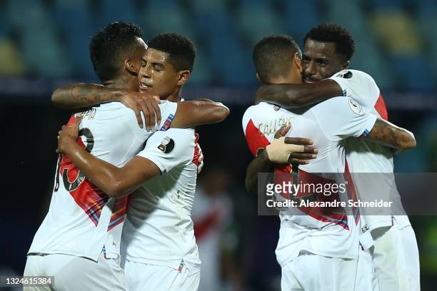 Renato Tapia of Peru celebrates with teammates after winning a group B match between Colombia and Peru as part of Copa America Brazil 2021 at Estadio...
