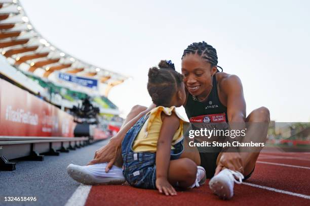 Allyson Felix celebrates with her daughter Camryn after finishing second in the Women's 400 Meters Final on day three of the 2020 U.S. Olympic Track...