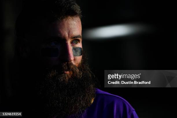 Charlie Blackmon of the Colorado Rockies looks on from the dugout during a game against the San Diego Padres at Coors Field on June 14, 2021 in...
