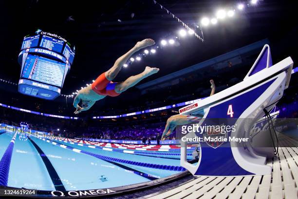 Caeleb Dressel of the United States competes in the Men's 50m freestyle final during Day Eight of the 2021 U.S. Olympic Team Swimming Trials at CHI...