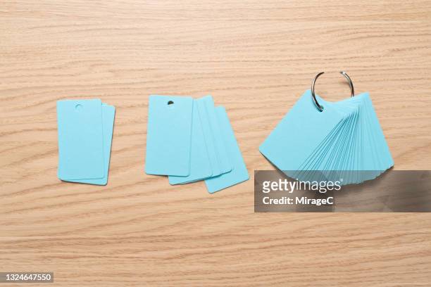 blank separate cards split from blue colored flashcard - flash card stock pictures, royalty-free photos & images