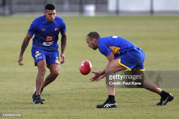 Tim Kelly and Dom Sheed in action during a West Coast Eagles AFL media opportunity at Mineral Resources Park on June 21, 2021 in Perth, Australia.
