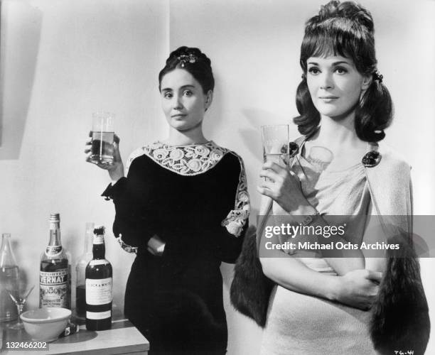 Kathleen Widdoes and Jessica Walter at a cocktail party in a scene from the film 'The Group', 1966.