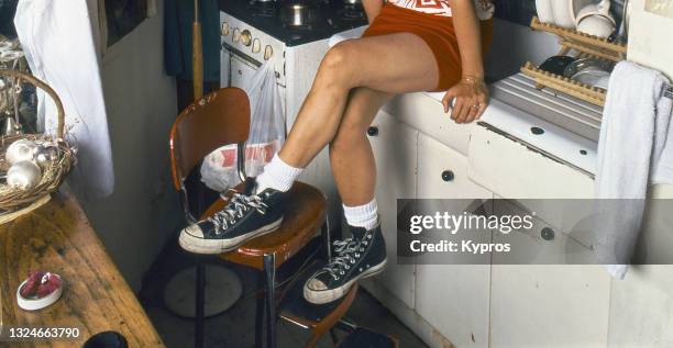 young woman's legs with sneakers - playa del rey, california, usa, 1988 - america 1988 stock pictures, royalty-free photos & images