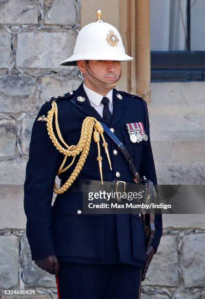 Lieutenant Colonel Tom White attends a military parade, held by the Household Division in the Quadrangle of Windsor Castle, to mark Queen Elizabeth...