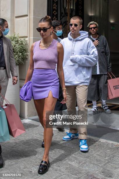 Justin Bieber and wife Hailey Baldwin Bieber leave the 'KITH' store on June 21, 2021 in Paris, France.