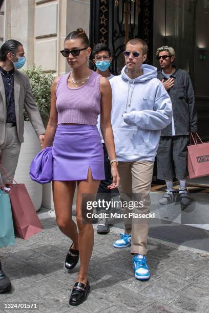 Justin Bieber and wife Hailey Baldwin Bieber leave the 'KITH' store on June 21, 2021 in Paris, France.