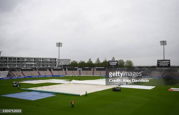General view of the covers as play is abandoned for the day on Day 4 of the ICC World Test Championship Final between India and New Zealand at The...