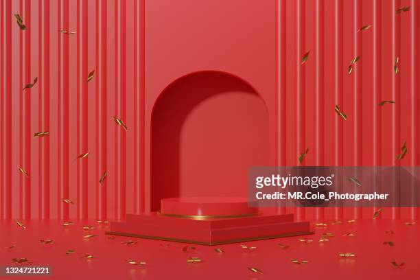 red stage podium on the floor background with glod confetti - winners podium stockfoto's en -beelden