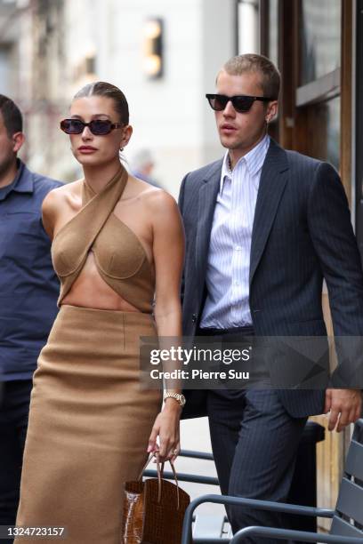 Hailey Bieber and Justin Bieber are seen coming out of a restaurant on June 21, 2021 in Paris, France.