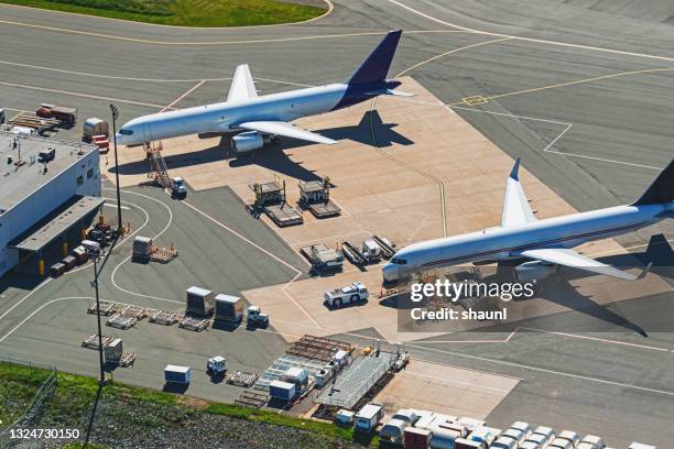 aerial view of cargo jets - airport aerial stock pictures, royalty-free photos & images