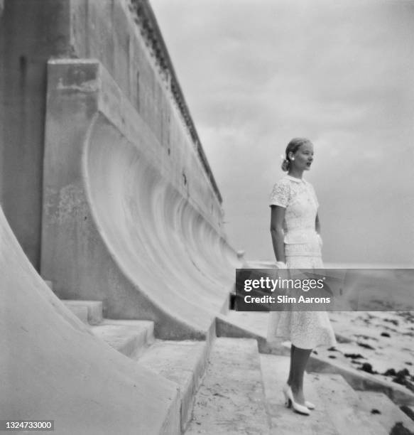 American socialite Lucy Douglas Cochrane Guest, better known as CZ Guest, on the beach at Villa Artemis, the Guest family Palm Beach estate, Florida,...