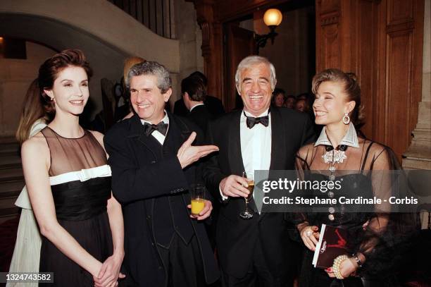 Alessandra Martines, Claude Lelouch, Jean Paul Belmondo and Natty Belmondo attend the reopening Gala of the Opéra de Paris on March 18, 1996 in...