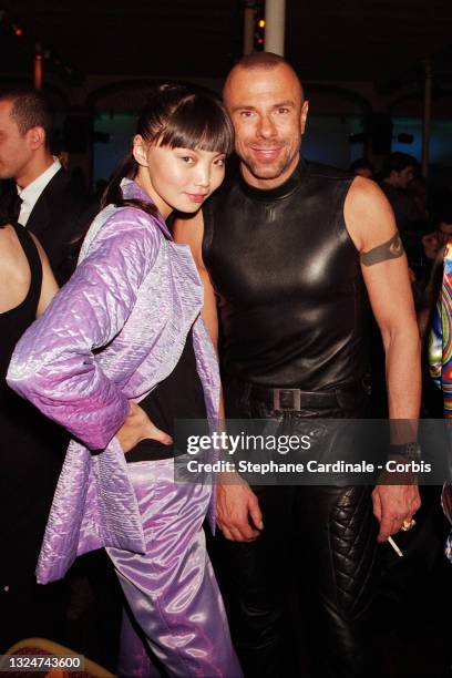 Fashion designer Thierry Mugler pose with a model during the « Venus de la Mode » at Salle Wagram as part of Paris Fashion Week on March 17, 1996 in...