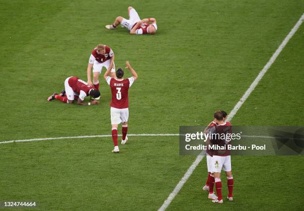 Aleksandar Dragovic, Florian Grillitsch and Stefan Ilsanker of Austria celebrate their side's victory after the UEFA Euro 2020 Championship Group C...