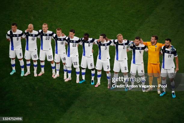 Players of Finland stand for the national anthem prior to the UEFA Euro 2020 Championship Group B match between Finland and Belgium at Saint...