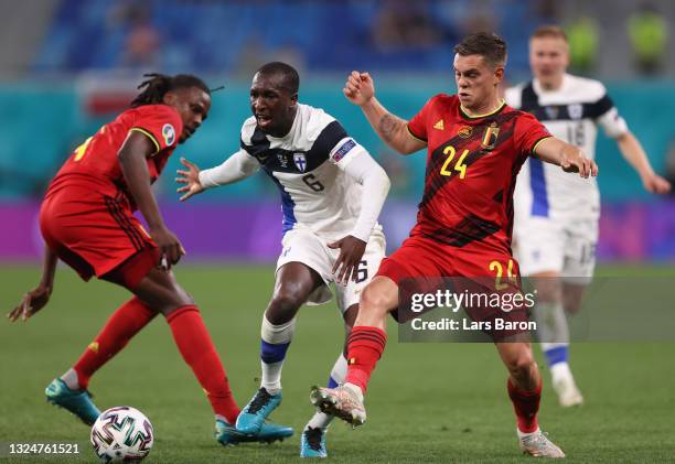 Glen Kamara of Finland is challenged by Leandro Trossard of Belgium during the UEFA Euro 2020 Championship Group B match between Finland and Belgium...