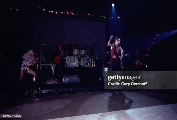 Married American performers dancer Sheryl Goddard and Rock singer Alice Cooper perform onstage during the 'Flush the Fashion' tour at the Palladium,...