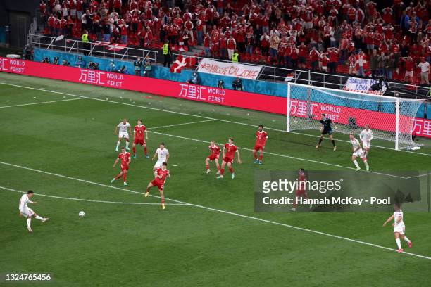 Andreas Christensen of Denmark scores their side's third goal past Matvei Safonov of Russia during the UEFA Euro 2020 Championship Group B match...