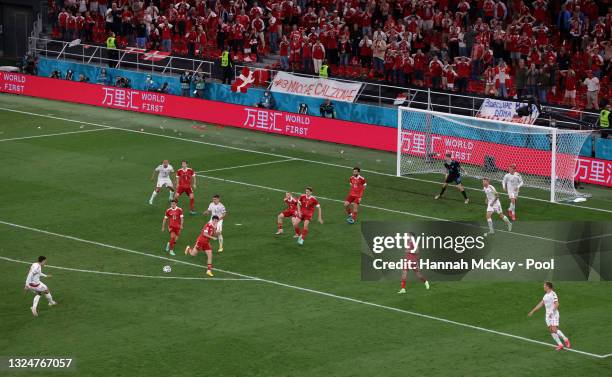 Andreas Christensen of Denmark scores their side's third goal past Matvei Safonov of Russia during the UEFA Euro 2020 Championship Group B match...