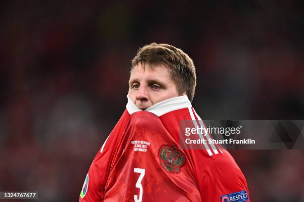 Igor Diveev of Russia looks dejected following defeat in the UEFA Euro 2020 Championship Group B match between Russia and Denmark at Parken Stadium...