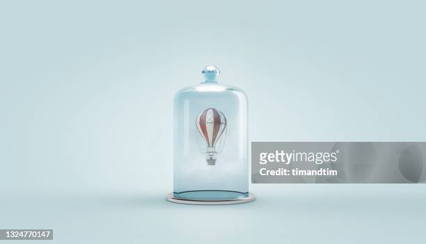 hot air ballon inside a bell jar - bell jar ストックフォトと画像