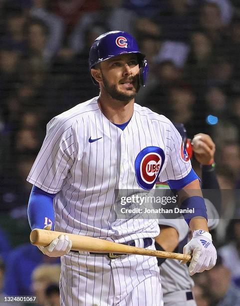 Kris Bryant of the Chicago Cubs reacts after striking out in the 6th inning against the Cleveland Indians at Wrigley Field on June 21, 2021 in...