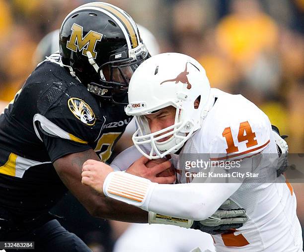 Missouri Tigers defensive lineman Jacquies Smith dropped Texas Longhorns quarterback David Ash for a loss in the third quarter. The University of...