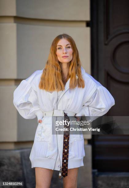 Lisa Banholzer is seen wearing total look Louis Vuitton, white jacket, belt, shoes on June 21, 2021 in Berlin, Germany.