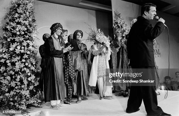 Rohit Bal, fashion designer, during a curtain call from New Delhi, India, December 21, 1996. Bal designs for both men and women.