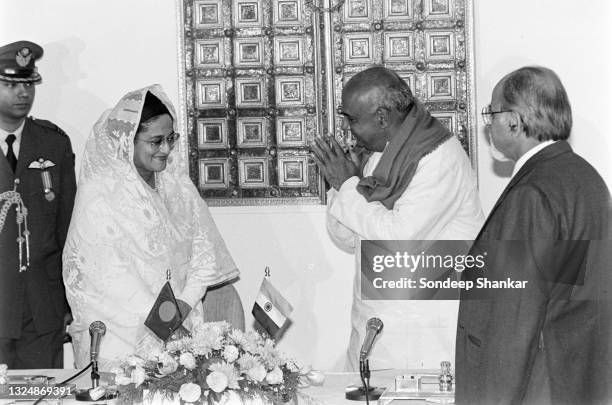 Prime Minister of India H D Deve Gowda with his Bangladesh counterpart Sheikh Hasina sign an agreement for sharing river Ganga water treaty in New...