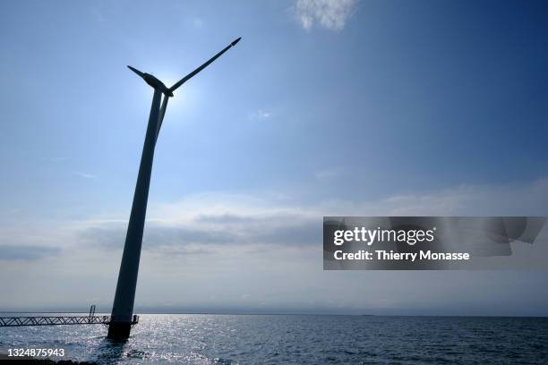 Wind Turbines are seen at the coast line of the Ijsselmeer on June 20, 2021 Near Lelystad, Kingdom of the Netherlands.