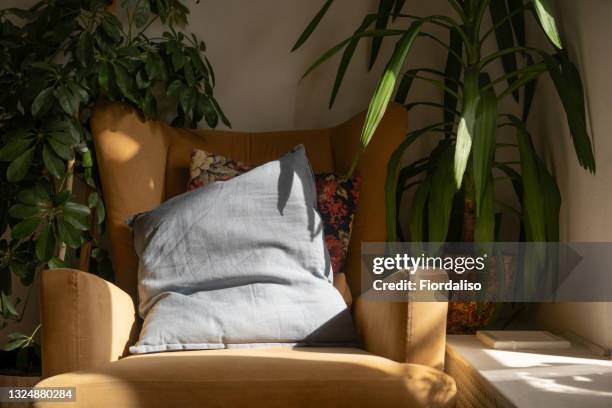 cozy work place at home - cushion stockfoto's en -beelden