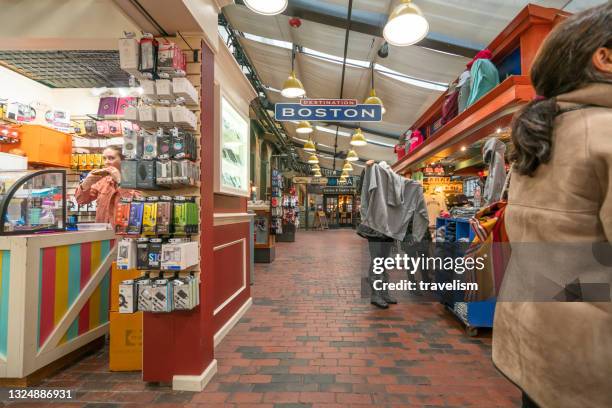 quincy market in faneuil hall marketplace, boston, massachusetts. - boston fern stock-fotos und bilder