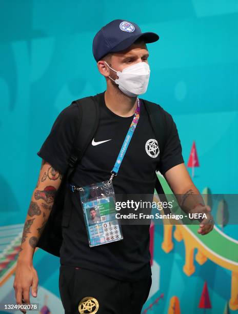 Michal Duris of Slovakia is seen wearing a face mask as he arrives at the stadium prior to the Slovakia Training Session ahead of the UEFA Euro 2020...