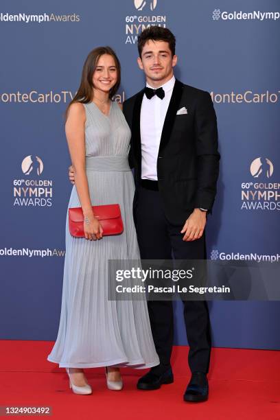 Charles Leclerc and Charlotte Siné arrive at the closing ceremony of the 60th Monte Carlo TV Festival on June 22, 2021 in Monte-Carlo, Monaco.