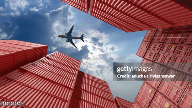 plane above a container in a warehouse. - loading plane stock pictures, royalty-free photos & images