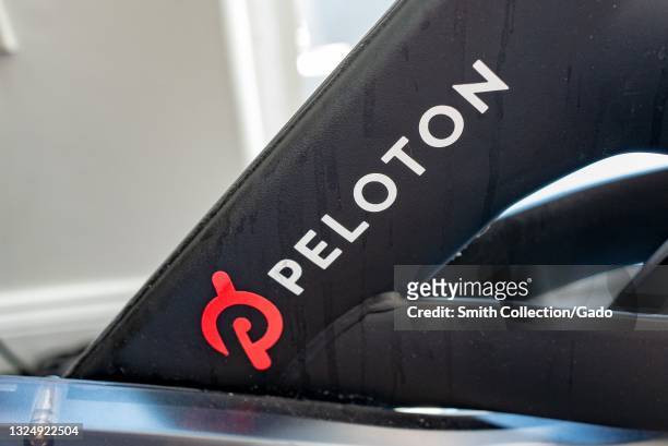 Close-up of logo for Peloton on exercise bicycle, San Francisco, California, June 14, 2021.