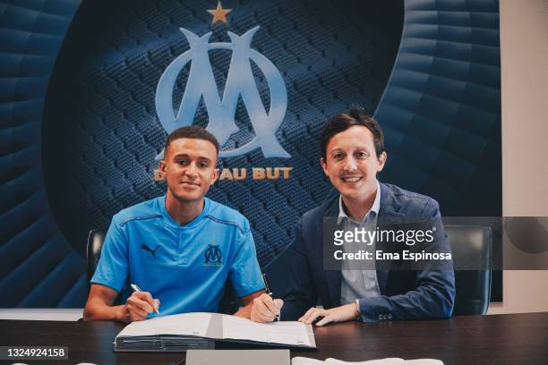 New Olympique de Marseille signing Salim Ben Seghir with Olympique de Marseille President Pablo Longoria at Centre Robert-Louis Dreyfus on June 22,...
