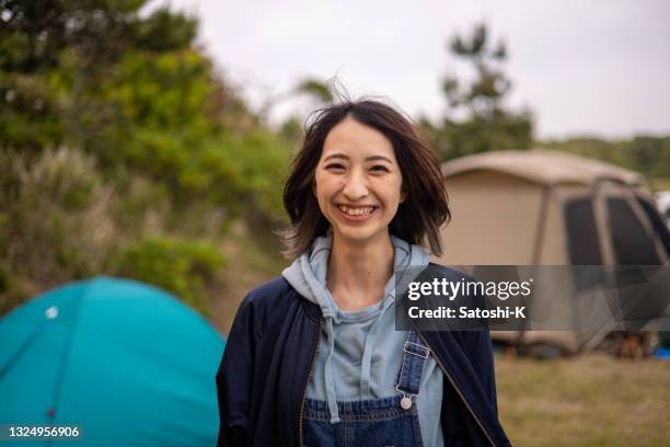 portrait of young woman at camp - portrait of a camper stock pictures, royalty-free photos & images