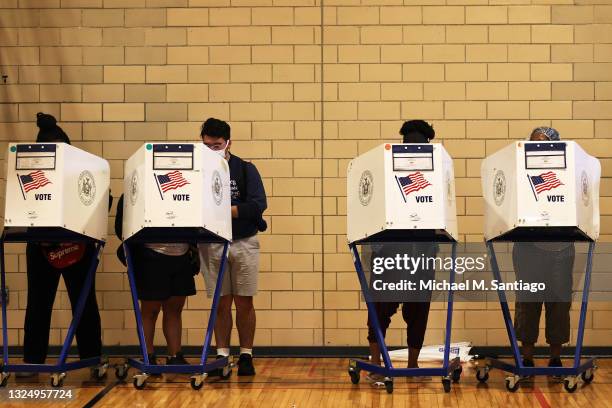 People vote during the Primary Election Day at P.S. 249 The Caton School on June 22, 2021 in the Flatbush neighborhood of Brooklyn borough in New...