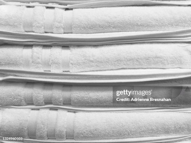 stack of white towels - striped towel stock pictures, royalty-free photos & images