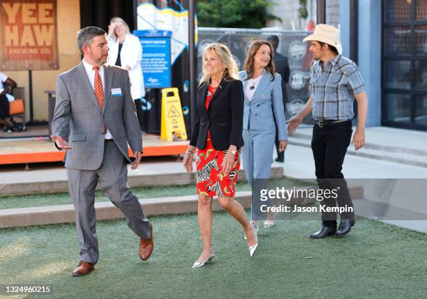 Jeremy Crain of Kroger Health Division, First Lady Jill Biden, Kimberly Williams-Paisley and singer & songwriter Brad Paisley tour a Pop-Up...