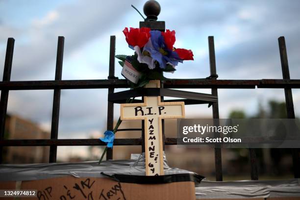 Makeshift memorial sits on the site where Gyovanni Arzuaga and his girlfriend Yasmin Perez were shot during an altercation following a minor traffic...